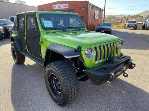 2018 Jeep Wrangler Unlimited for sale at BERKENKOTTER MOTORS in Brighton CO