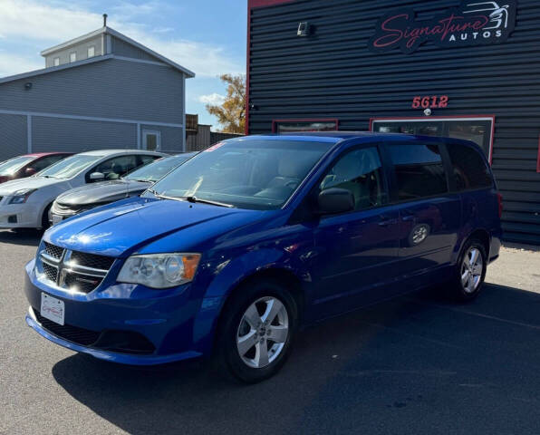 2013 Dodge Grand Caravan for sale at SIGNATURE AUTOS LLC in Weston, WI