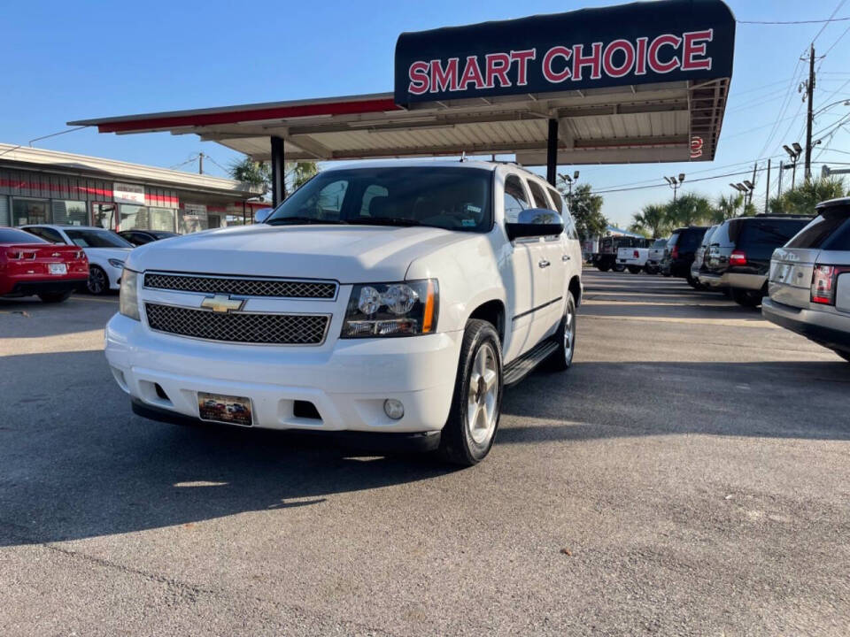 2011 Chevrolet Tahoe for sale at SMART CHOICE AUTO in Pasadena, TX