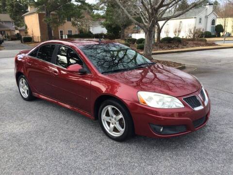 2009 Pontiac G6 for sale at Empire Auto Group in Cartersville GA