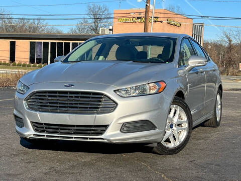 2015 Ford Fusion for sale at MAGIC AUTO SALES in Little Ferry NJ