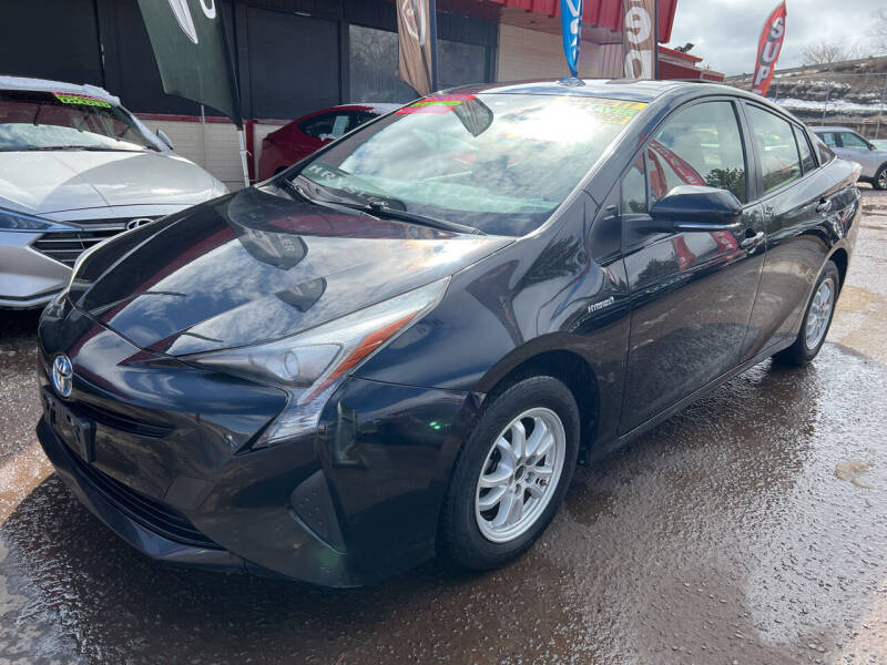 2016 Toyota Prius for sale at Duke City Auto LLC in Gallup NM