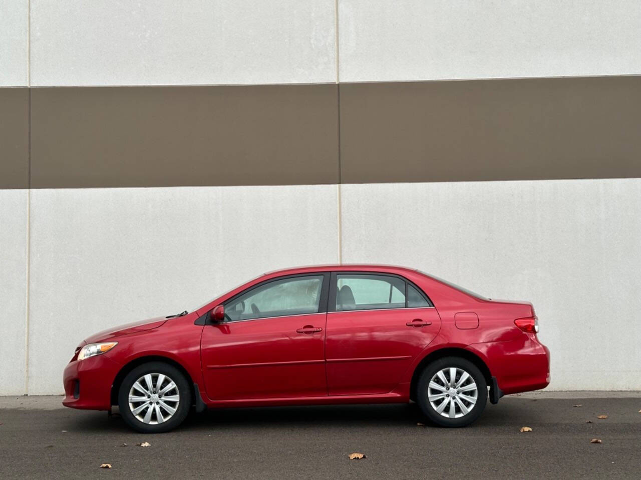 2013 Toyota Corolla for sale at Phoenix Motor Co in Romulus, MI