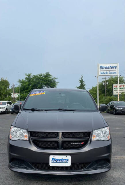 2014 Dodge Grand Caravan for sale at Streeters Vehicle Sales in Plattsburgh, NY