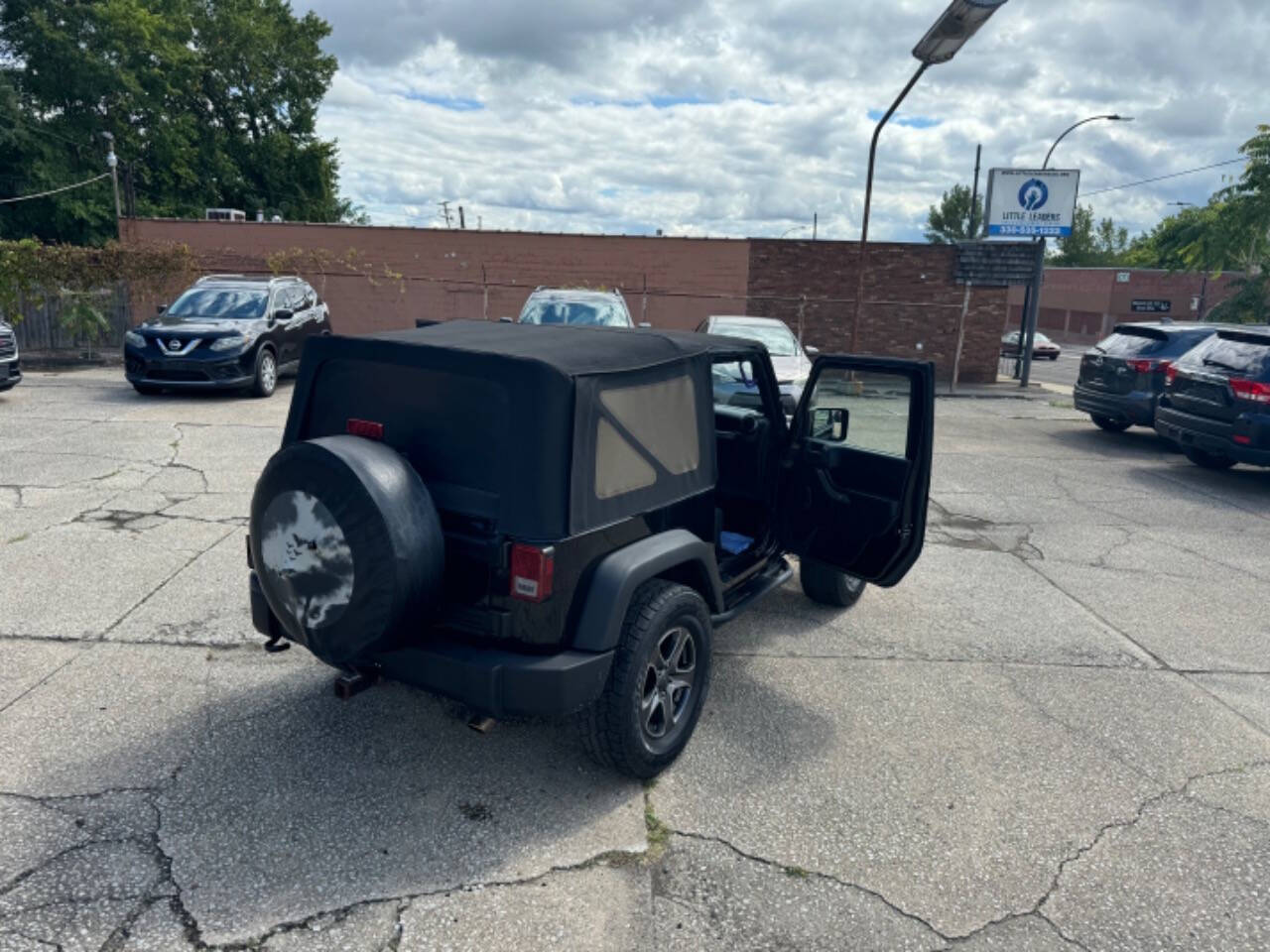 2011 Jeep Wrangler for sale at First Class Auto Mall in Akron, OH