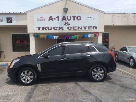 2014 Cadillac SRX for sale at A-1 AUTO AND TRUCK CENTER in Memphis TN