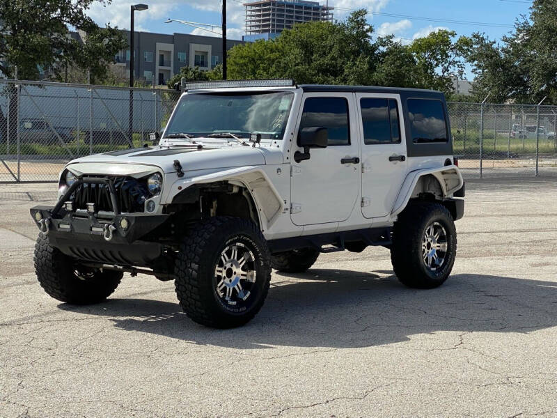 2015 Jeep Wrangler Unlimited for sale at EA Motorgroup in Austin TX