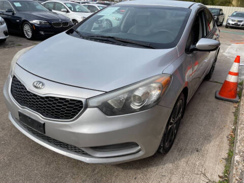 2015 Kia Forte for sale at Sam's Auto Sales in Houston TX