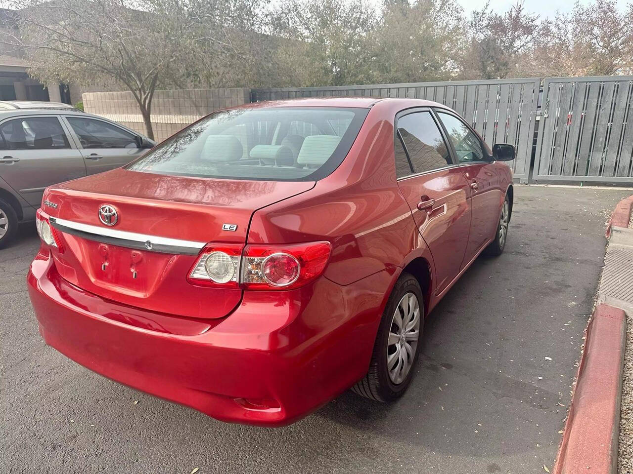 2013 Toyota Corolla for sale at HUDSONS AUTOS in Gilbert, AZ