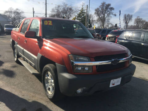 2002 Chevrolet Avalanche for sale at HIDALGOS AUTO SALES in Omaha NE