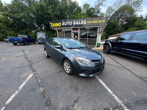 2014 Toyota Corolla for sale at Chinos Auto Sales in Crystal MN