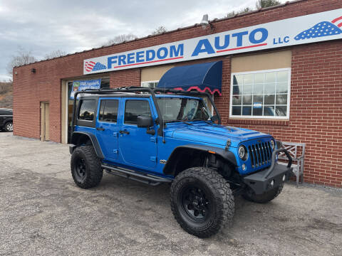 2014 Jeep Wrangler Unlimited for sale at FREEDOM AUTO LLC in Wilkesboro NC