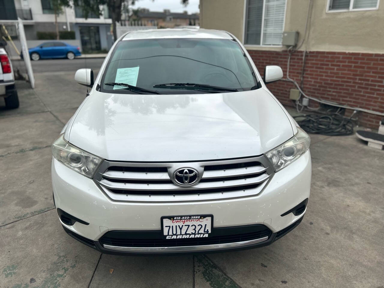 2012 Toyota Highlander for sale at Carmania in Panorama City, CA