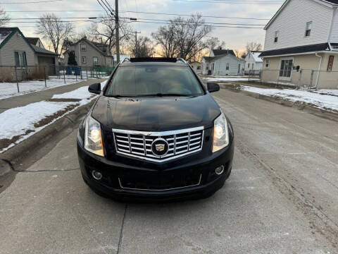 2013 Cadillac SRX for sale at Roman's Auto Sales in Warren MI