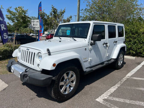 2015 Jeep Wrangler Unlimited for sale at Bay City Autosales in Tampa FL
