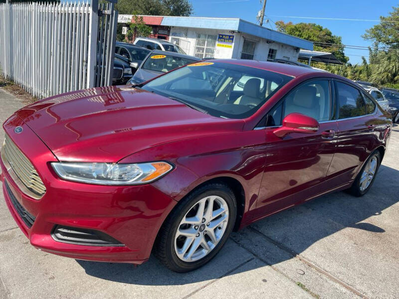 2014 Ford Fusion for sale at Plus Auto Sales in West Park FL