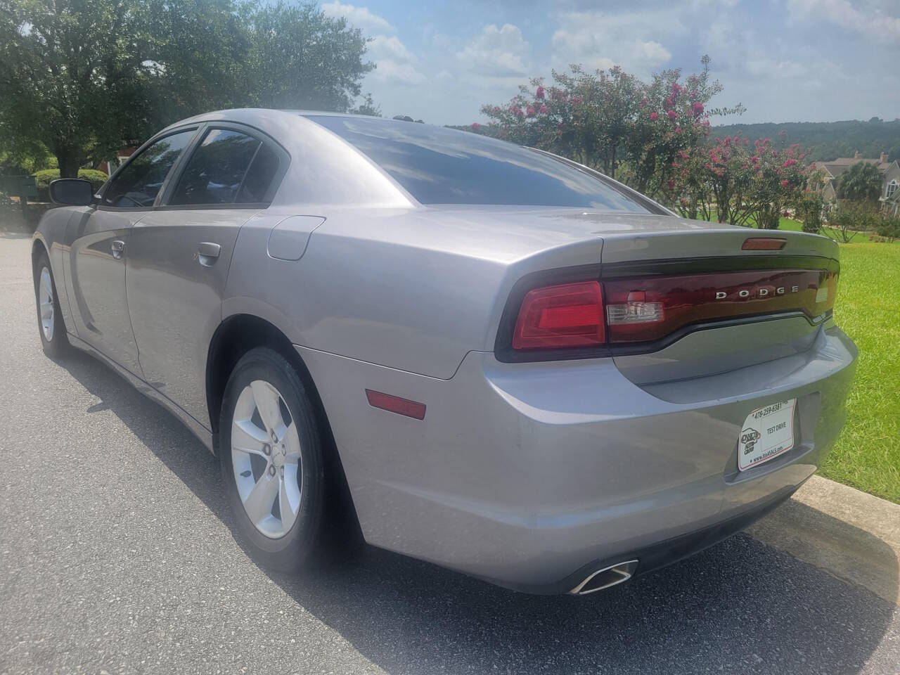 2014 Dodge Charger for sale at Connected Auto Group in Macon, GA