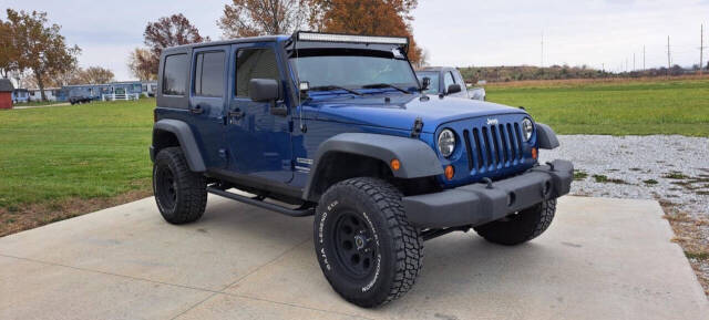 2010 Jeep Wrangler Unlimited for sale at CORNMAN AUTO LLC in Kirksville, MO