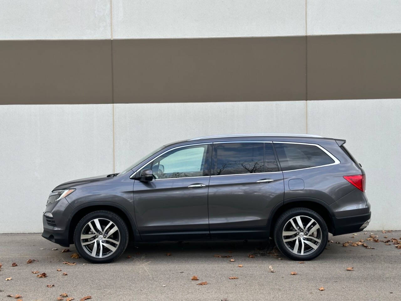 2017 Honda Pilot for sale at Phoenix Motor Co in Romulus, MI