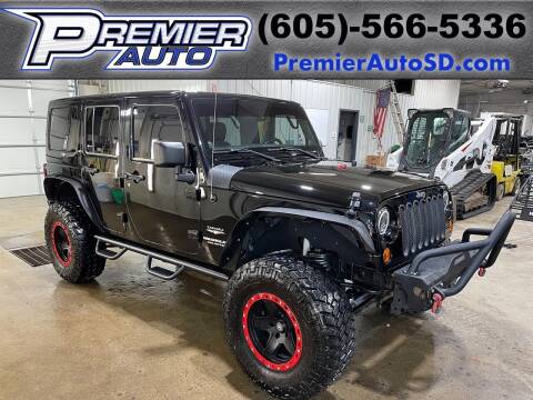 2013 Jeep Wrangler Unlimited for sale at Premier Auto in Sioux Falls SD