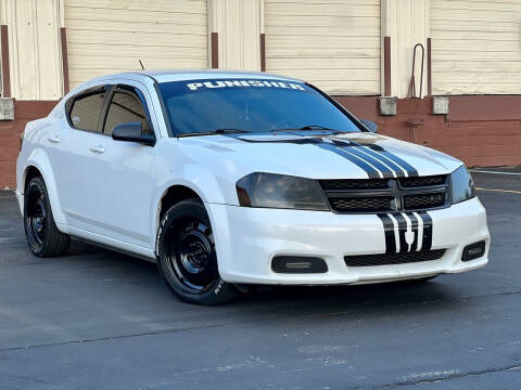 2013 Dodge Avenger for sale at EASYCAR GROUP in Orlando FL