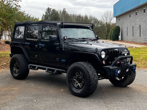 2014 Jeep Wrangler Unlimited for sale at Alta Auto Group LLC in Concord NC