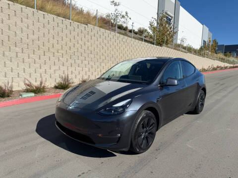 2024 Tesla Model Y for sale at DOSKI MOTORS INC in San Diego CA