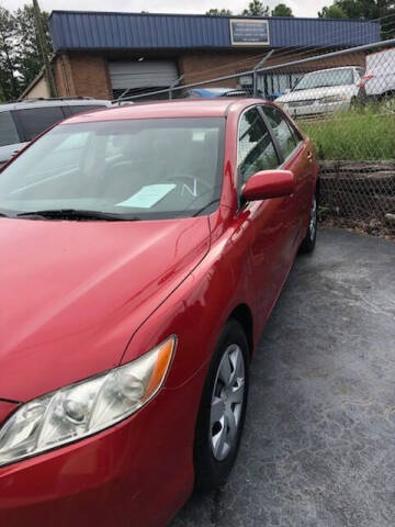 2009 Toyota Camry for sale at LAKE CITY AUTO SALES in Forest Park GA