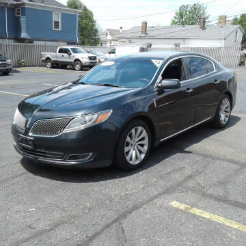 2014 Lincoln MKS for sale at Signature Auto Group in Massillon OH