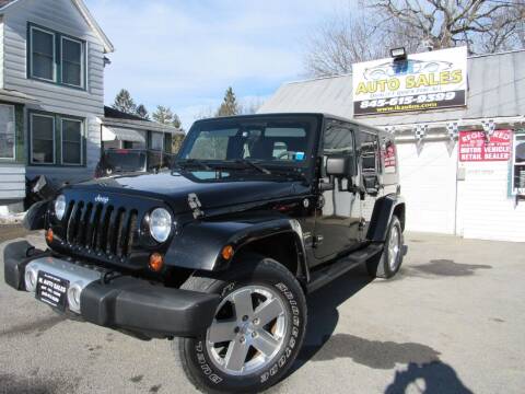 2009 Jeep Wrangler Unlimited for sale at IK AUTO SALES LLC in Goshen NY