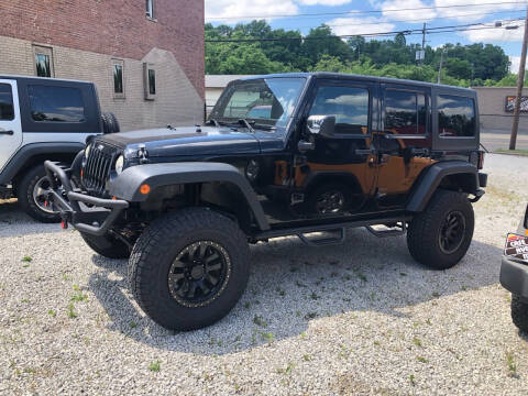 2011 Jeep Wrangler Unlimited for sale at CASE AVE MOTORS INC in Akron OH