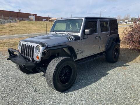 2013 Jeep Wrangler Unlimited for sale at Clayton Auto Sales in Winston-Salem NC