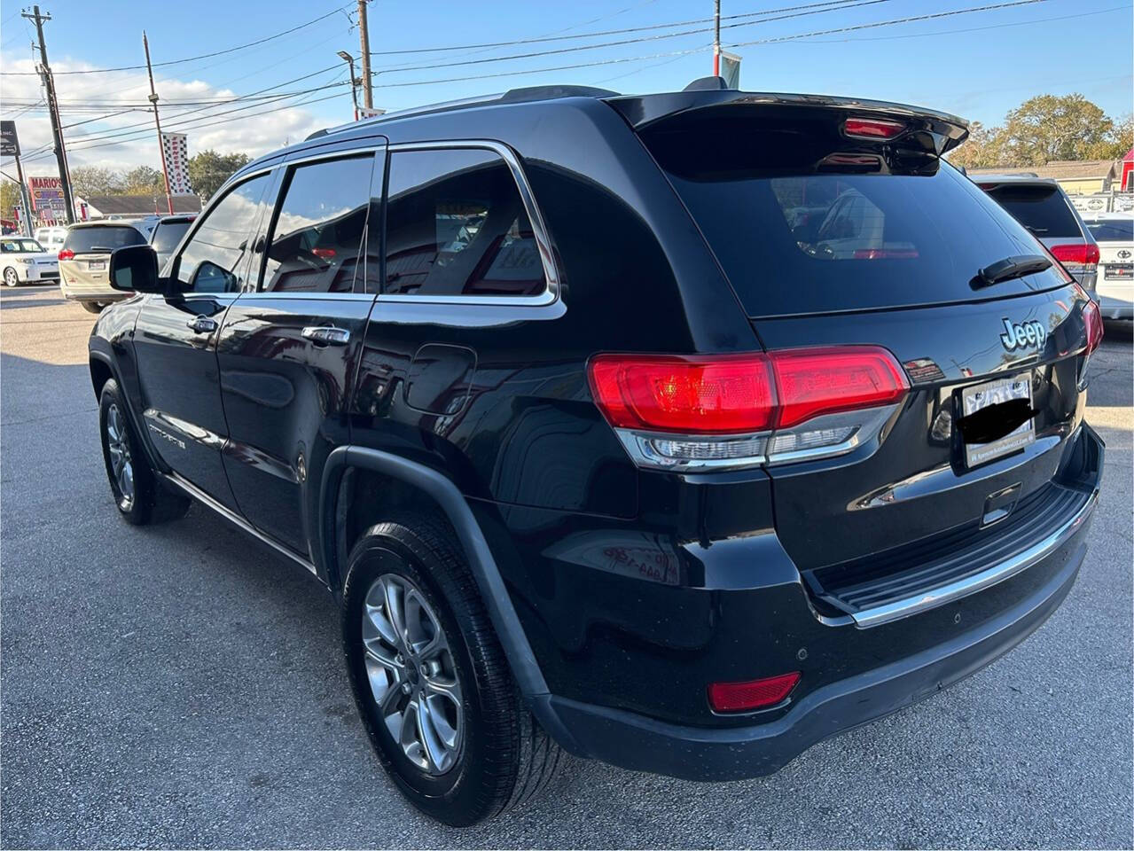 2015 Jeep Grand Cherokee for sale at SPENCER AUTO SALES in South Houston, TX