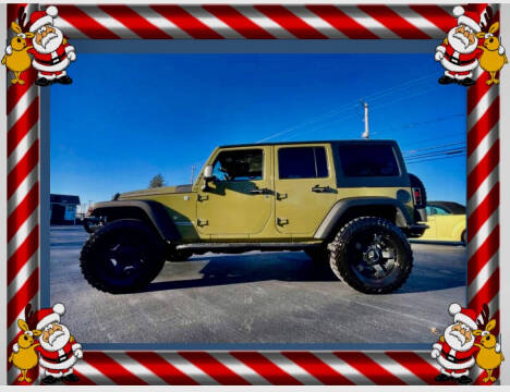 2013 Jeep Wrangler Unlimited for sale at Woolley Auto Group LLC in Poland OH