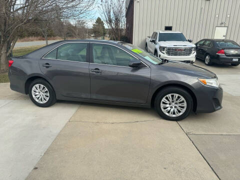 2014 Toyota Camry for sale at Super Sports & Imports Concord in Concord NC