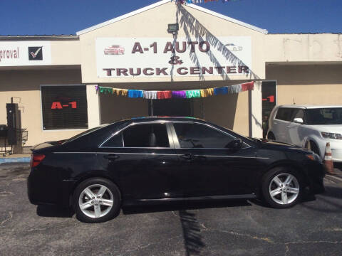 2014 Toyota Camry for sale at A-1 AUTO AND TRUCK CENTER in Memphis TN