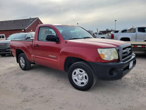 2009 Toyota Tacoma for sale at BERKENKOTTER MOTORS in Brighton CO
