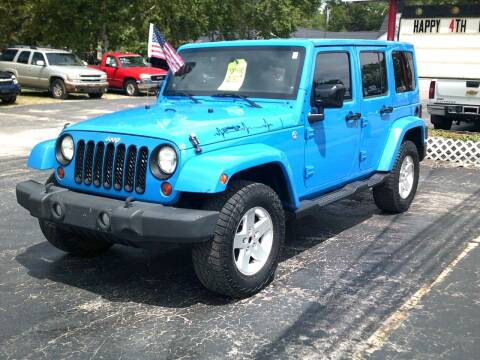 2011 Jeep Wrangler Unlimited for sale at LAKESIDE MOTORS LLC in Houghton Lake MI