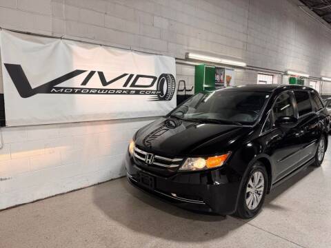 2014 Honda Odyssey for sale at VIVID MOTORWORKS, CORP. in Villa Park IL
