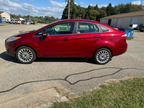 2016 Ford Fiesta for sale at J & K AUTO SALES LLC in Holland MI