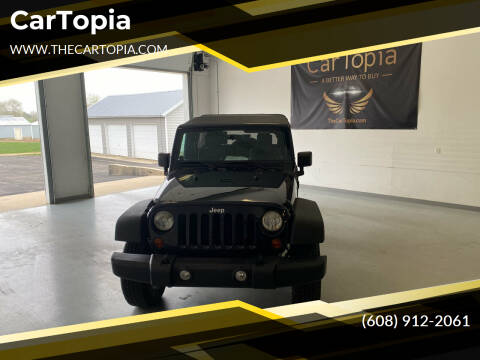 2010 Jeep Wrangler Unlimited for sale at CarTopia in Deforest WI