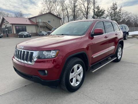 2013 Jeep Grand Cherokee for sale at Azteca Auto Sales LLC in Des Moines IA
