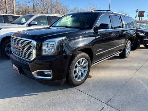 2015 GMC Yukon XL for sale at Azteca Auto Sales LLC in Des Moines IA