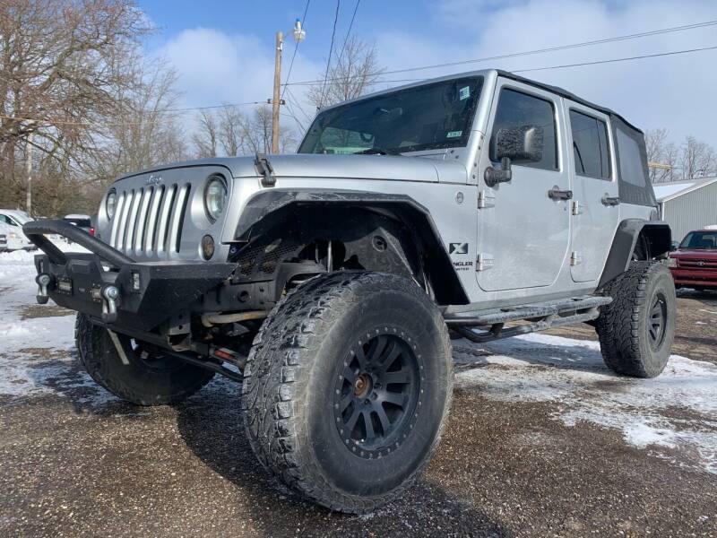 2009 Jeep Wrangler Unlimited for sale at MEDINA WHOLESALE LLC in Wadsworth OH