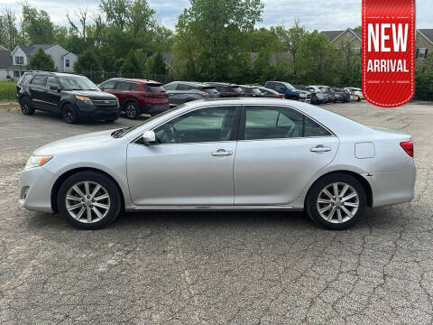 2013 Toyota Camry for sale at Auto Center of Columbus in Columbus OH