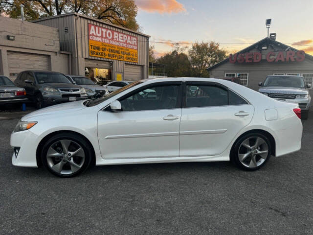 2014 Toyota Camry for sale at Walkem Autos in District Heights, MD