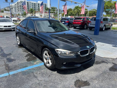 2015 BMW 3 Series for sale at THE SHOWROOM in Miami FL