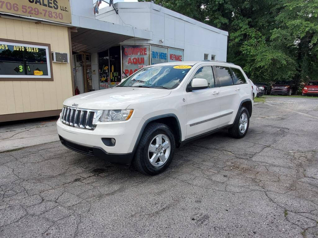 2011 Jeep Grand Cherokee for sale at DAGO'S AUTO SALES LLC in Dalton, GA