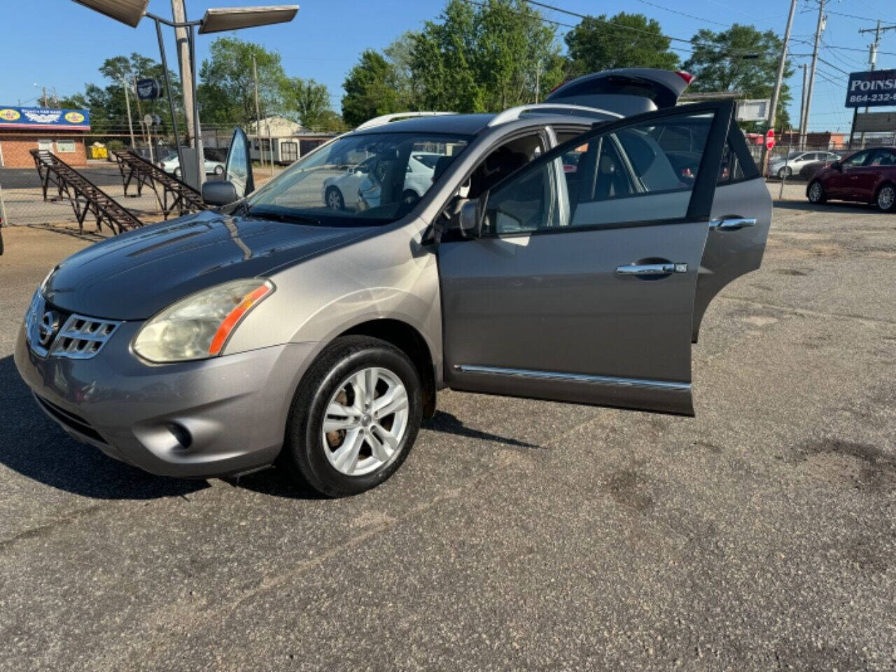 2013 Nissan Rogue for sale at Greenville Luxury Motors in Greenville, SC