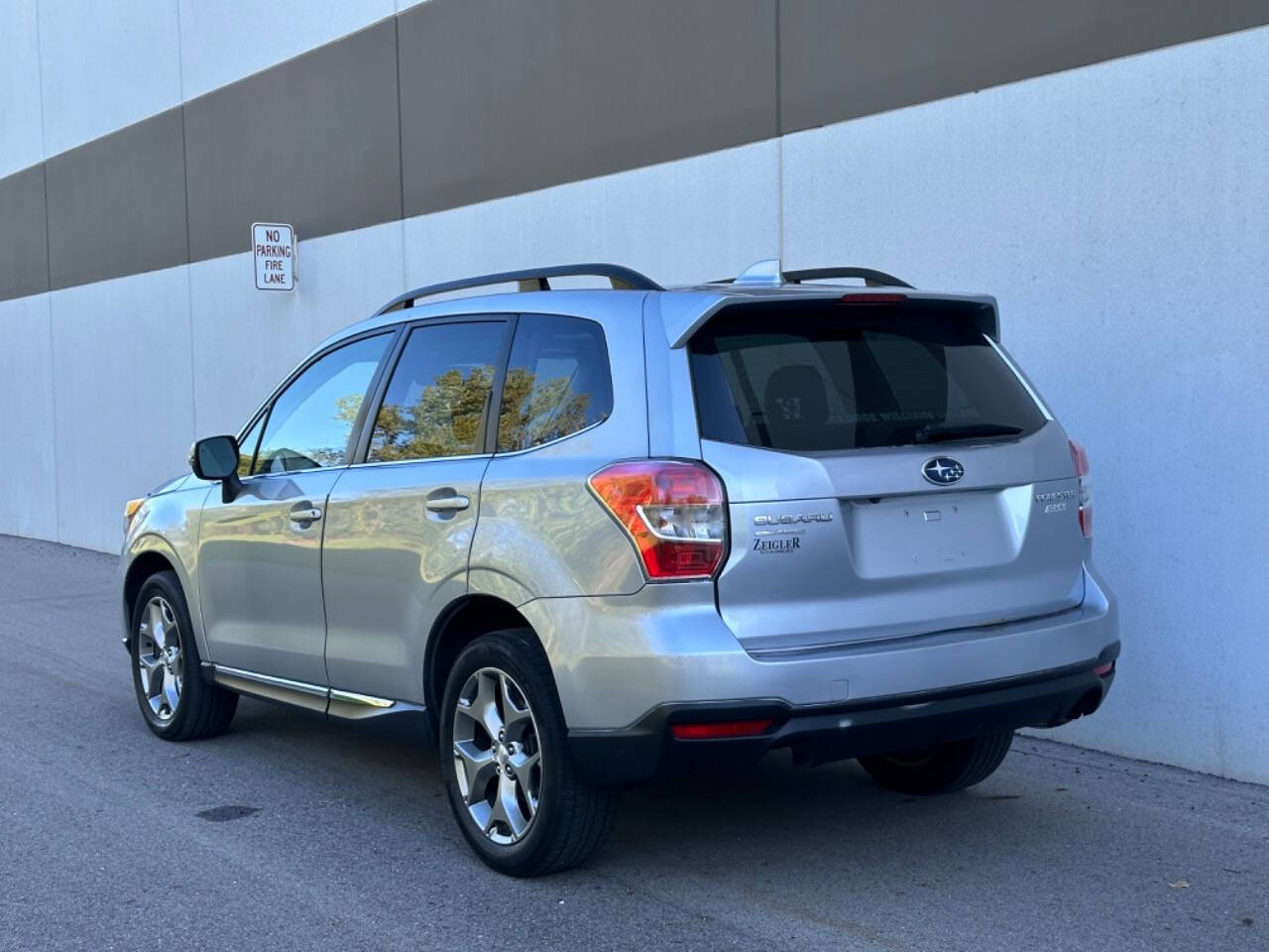 2016 Subaru Forester for sale at Phoenix Motor Co in Romulus, MI